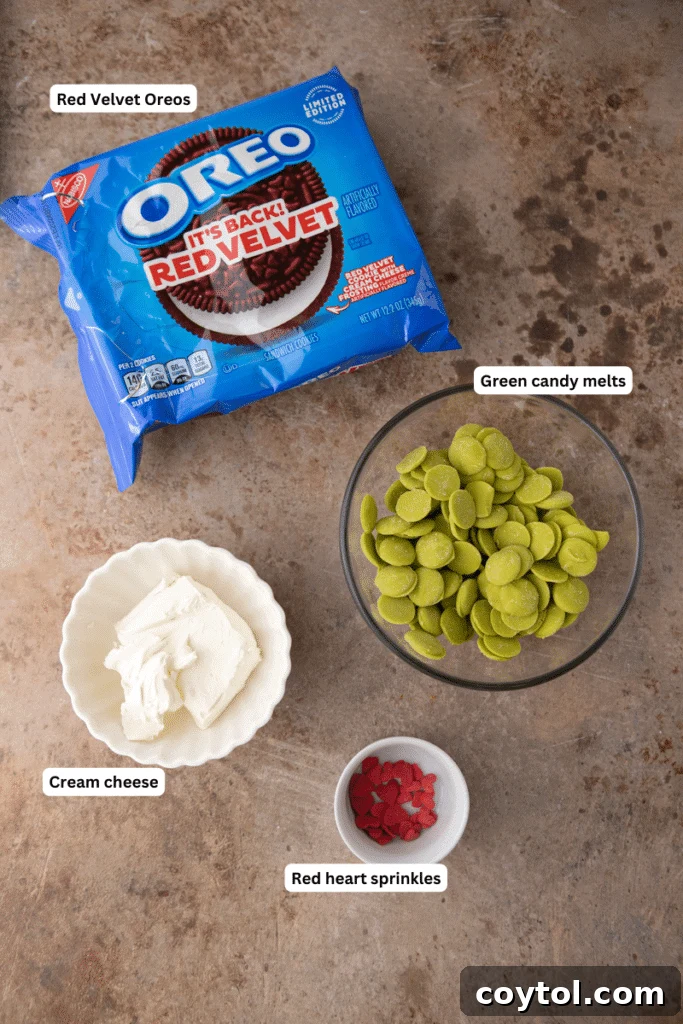 ingredients for the grinch oreo truffles laid out on a table