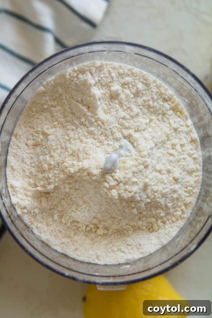 pressing shortbread crust into pan
