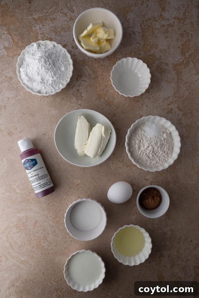 A vibrant flat lay of all the essential ingredients artfully arranged for making the small batch Red Velvet cupcakes.