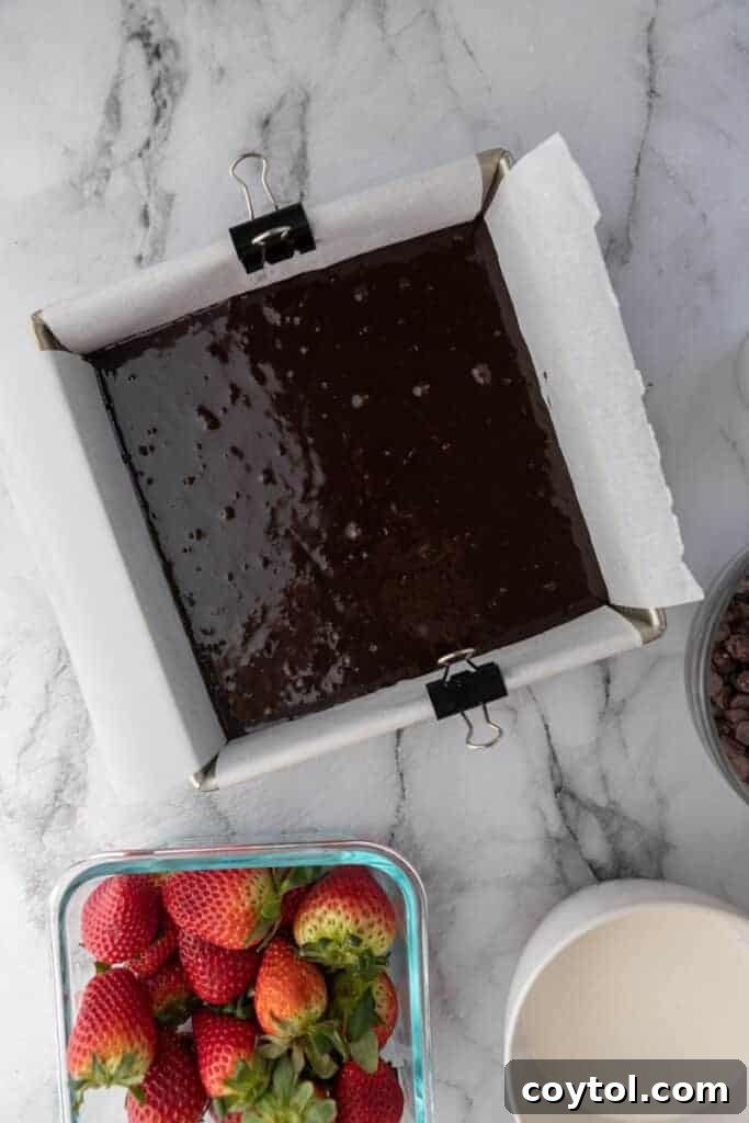 Brownie batter in a pan