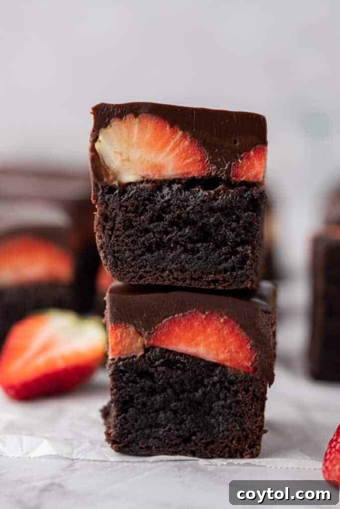 Stack of chocolate covered strawberry brownie recipe.