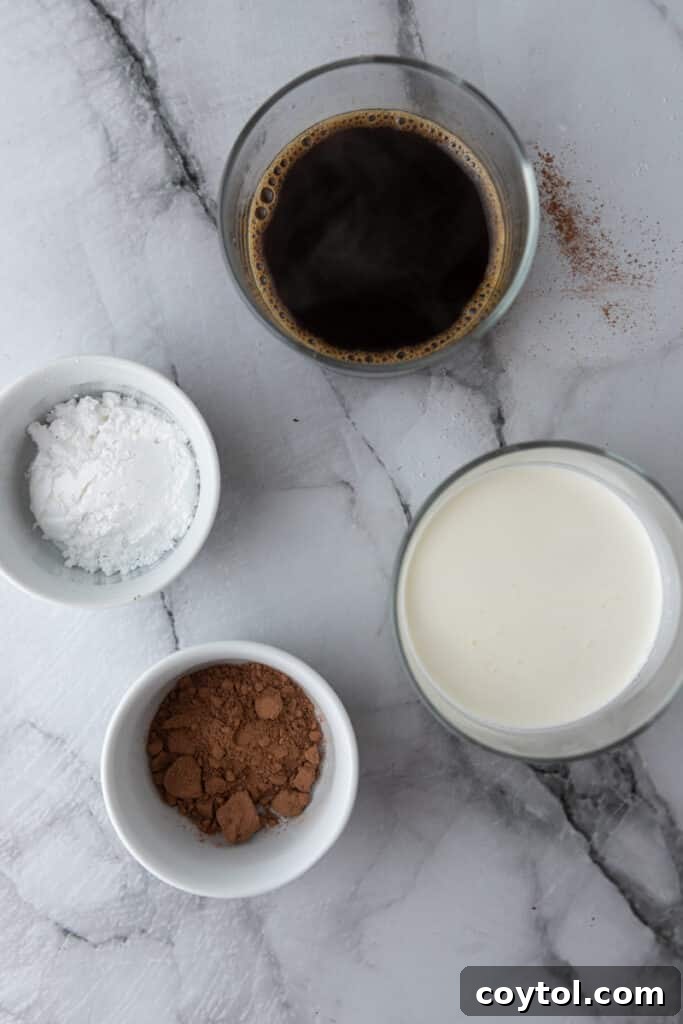 Fresh ingredients laid out for making Einspanner coffee: espresso, powdered sugar, and cream.