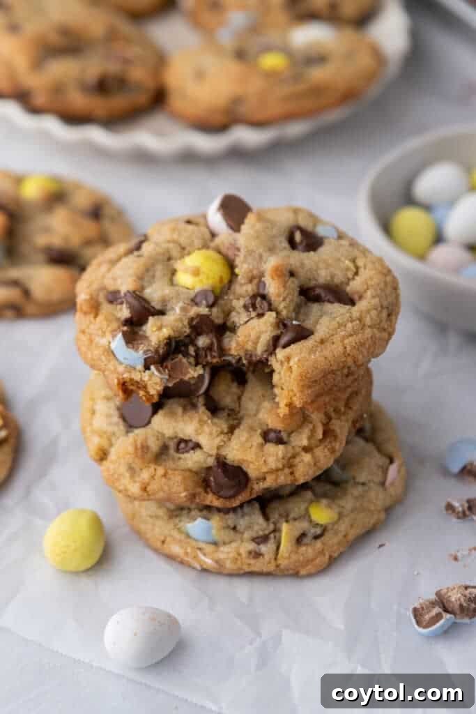 Irresistible Easter Mini Cadbury Egg Chocolate Chip Cookies 4 Stack of freshly baked Cadbury Egg Cookies, showcasing their appealing texture and colorful candy pieces