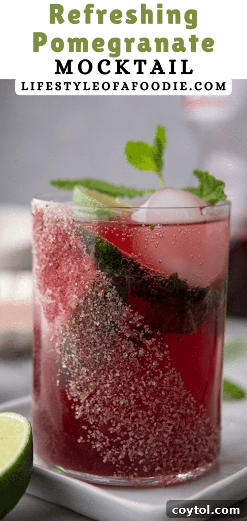 pinterest pin of the pomegranate mocktail recipe