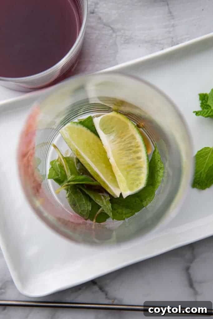 ingredients being dropped into the cup