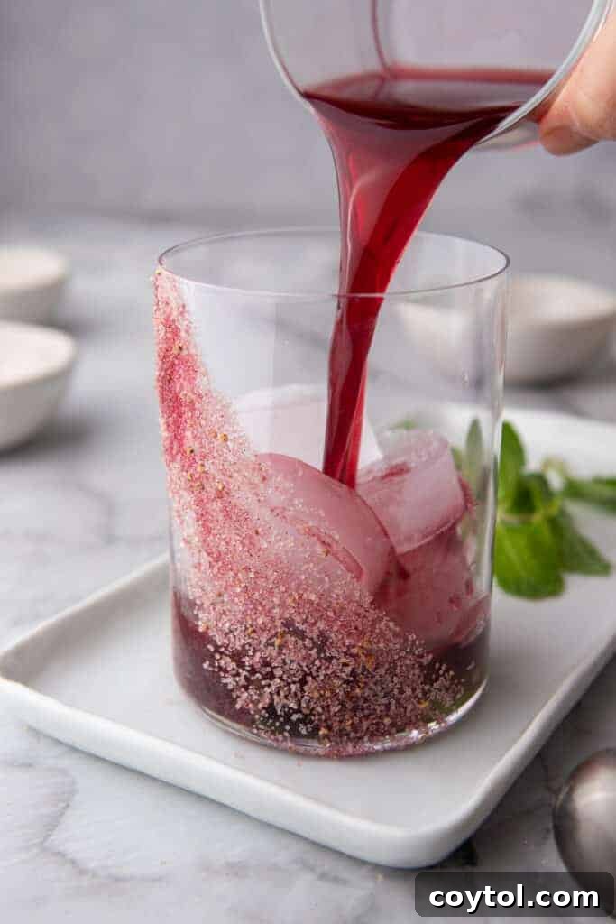 juice being poured into the glass