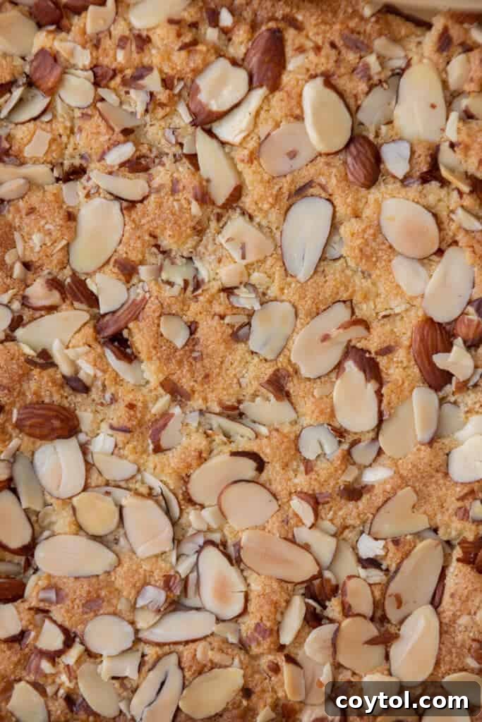 Close up shot of the filling and texture of an almond croissant blondie.