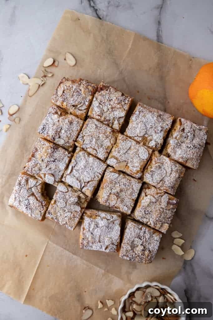 All the almond croissant blondies cut into perfect squares, ready to be served.