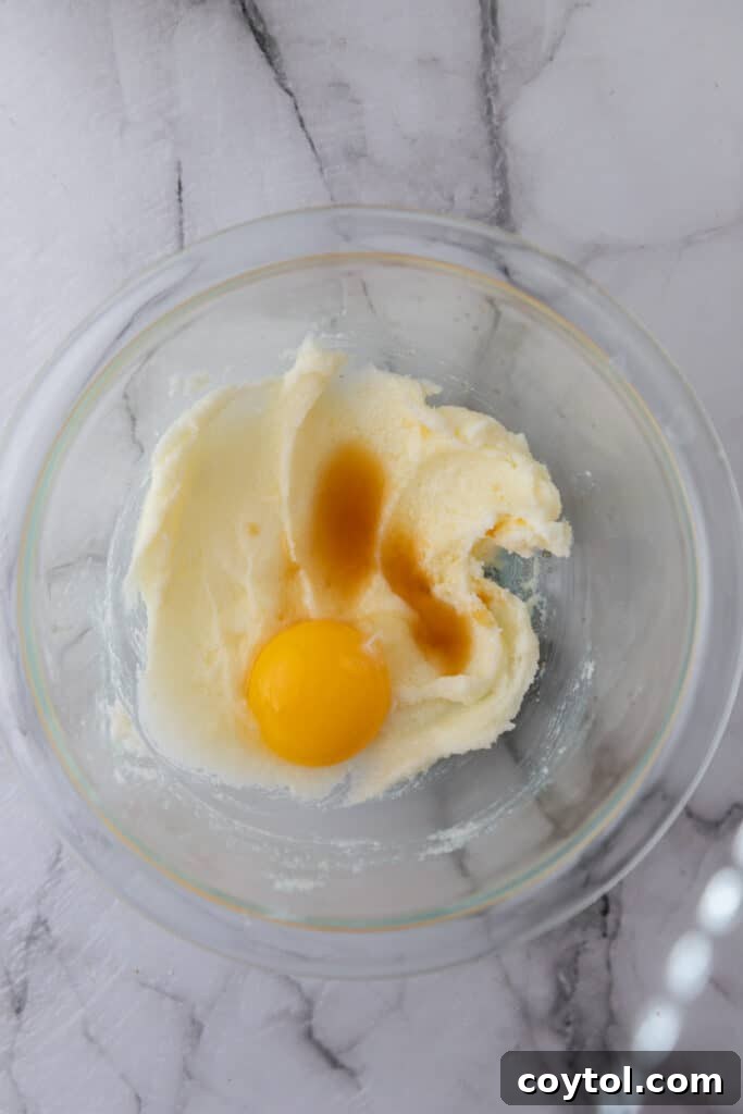Unmixed butter and brown sugar in a bowl for the blondie base.