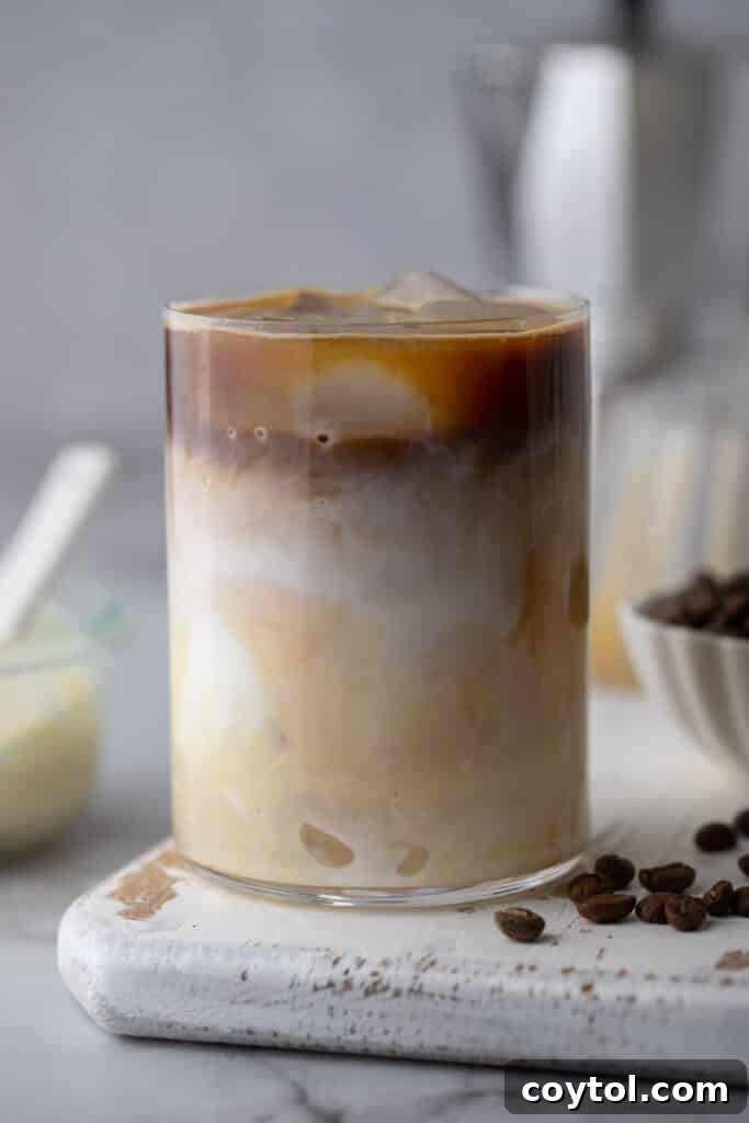 Easy Homemade Sweet Creamy Spanish Latte 6 espresso, milk and sweetened condensed milk in a glass with ice