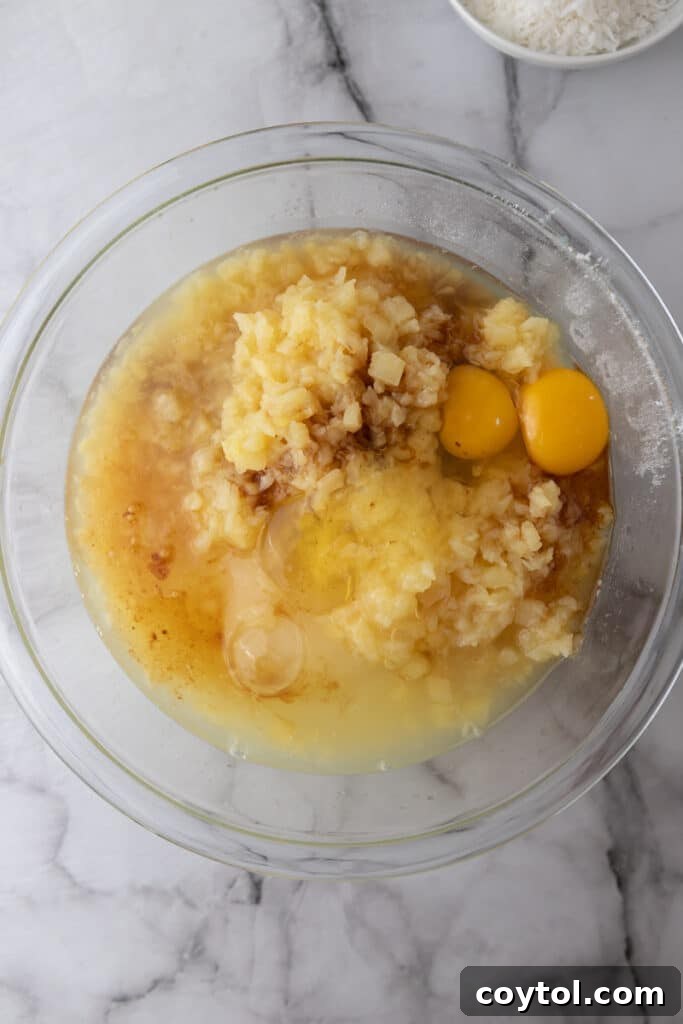 A bowl filled with the unmixed dry and wet ingredients for the Tornado Cake, prior to combining.