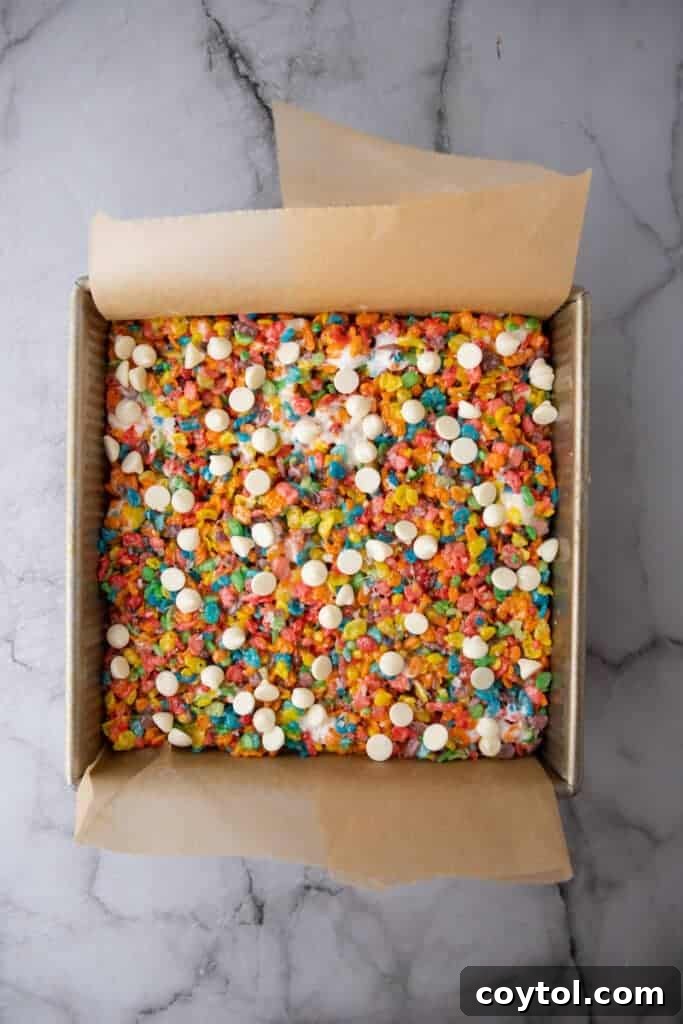 Fruity Pebbles Rice krispies in a pan