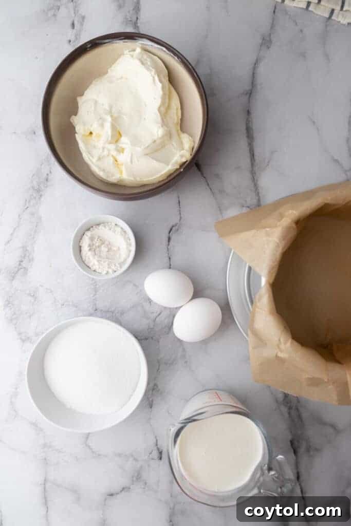 Essential ingredients laid out for preparing the 6-inch burnt Basque cheesecake recipe.