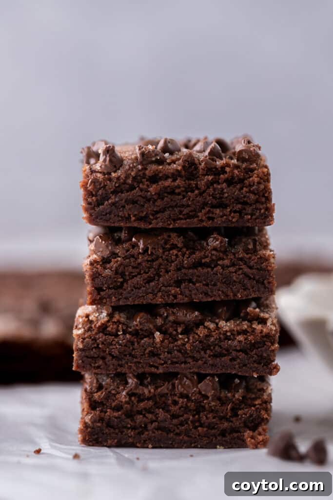 stack of chocolate sugar cookie bars cut into perfect squares