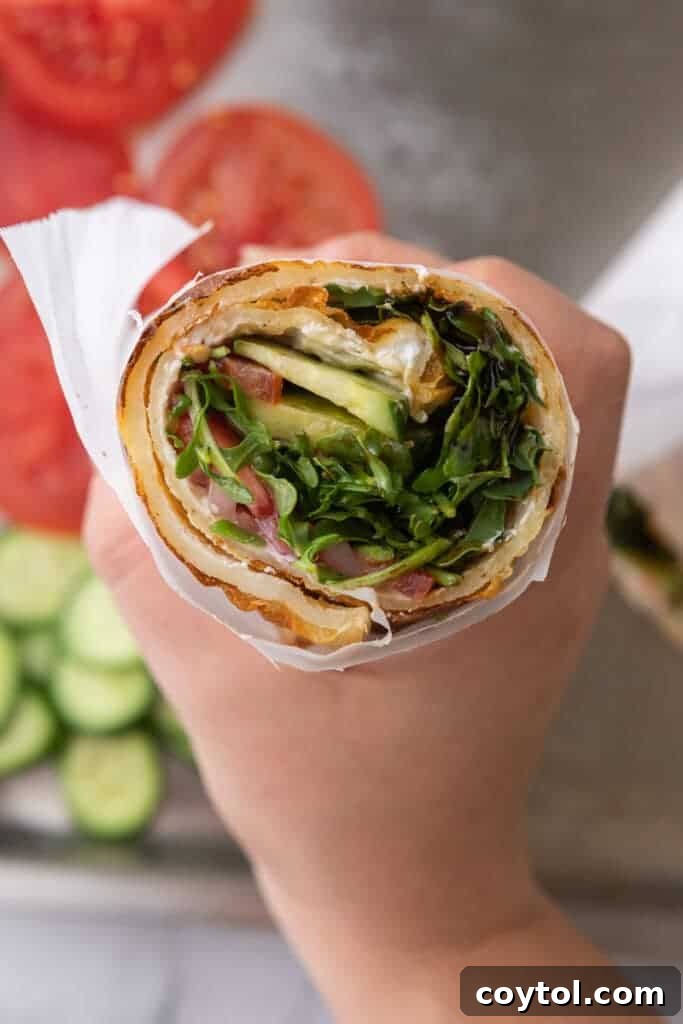 The Viral High-Protein Cottage Cheese Wrap Everyone's Raving About 12 Hand-holding Viral Tiktok Cottage Cheese Wrap