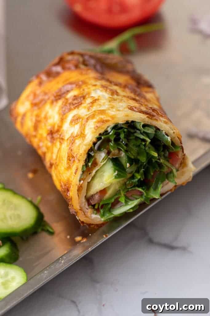 The Viral High-Protein Cottage Cheese Wrap Everyone's Raving About 4 Half a cottage cheese wrap sandwich