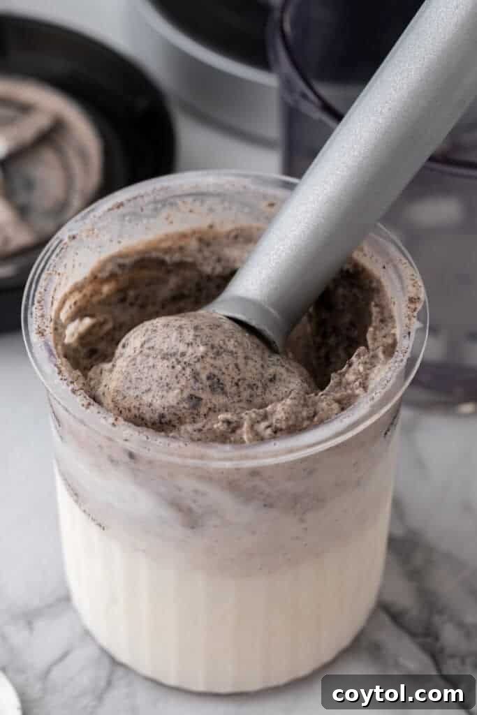 Ultimate Ninja Creami Cookies and Cream Perfection 14 ninja creami cookies and cream recipe getting scooped