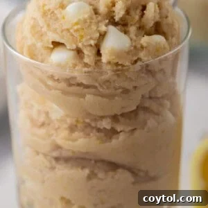 Edible lemon cookie dough in a cup, ready to be eaten