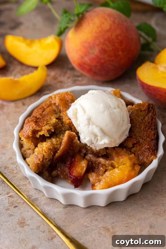 Overhead shot of a full dish of old fashioned peach cobbler
