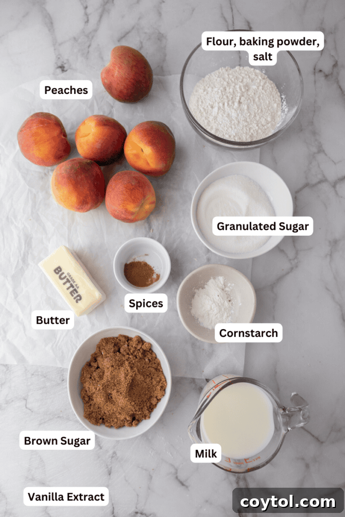 Fresh ingredients laid out for making old fashioned peach cobbler, including peaches, flour, sugar, and butter