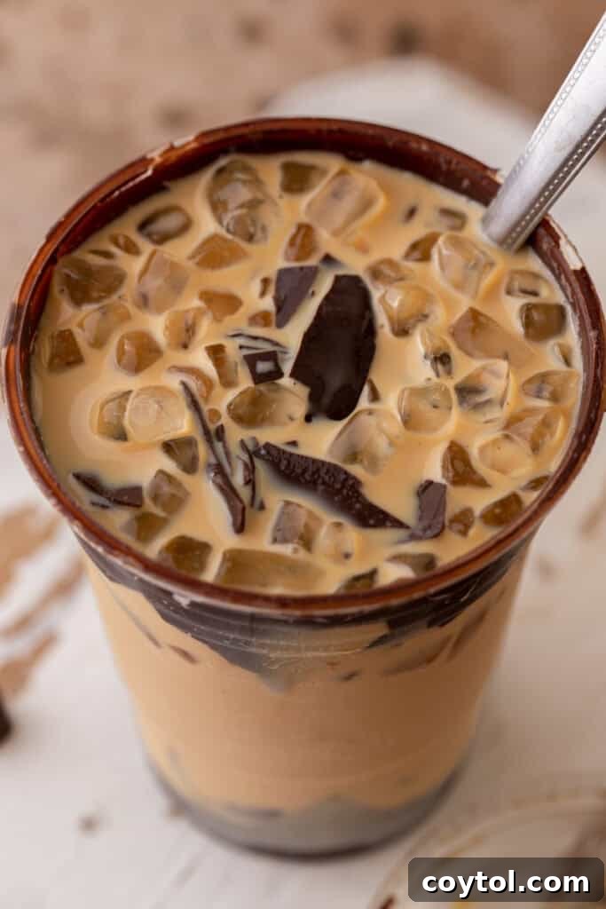 Recreate the Viral TikTok Cracking Iced Latte 3 Overhead view of cracking latte with ice nuggets