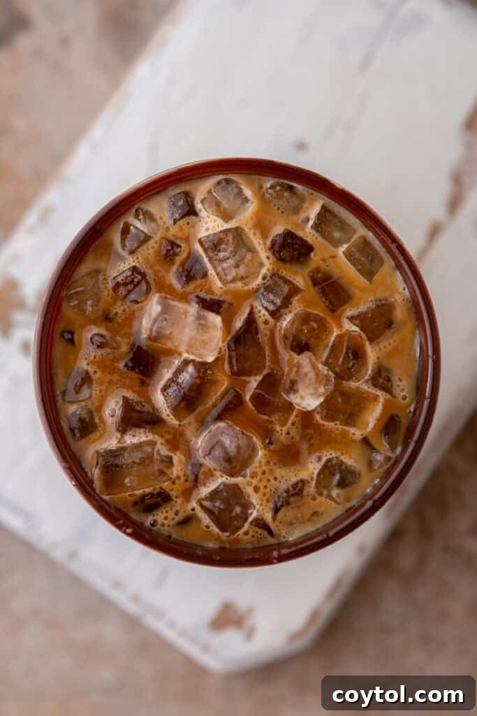 Recreate the Viral TikTok Cracking Iced Latte 8 Latte in chocolate cup shot from overhead