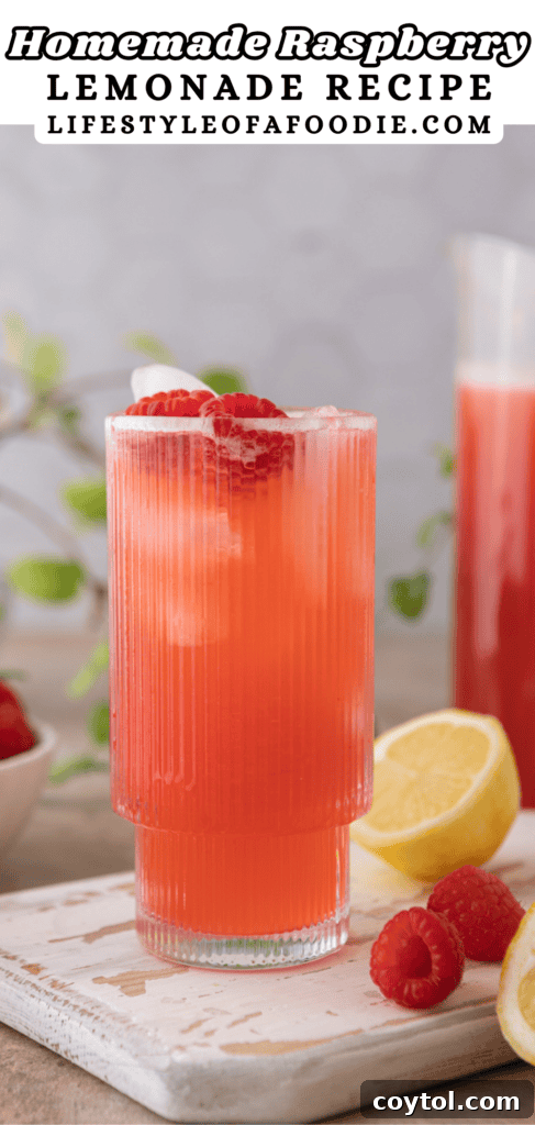 Pinterest pin for the raspberry lemonade recipe showing a pitcher