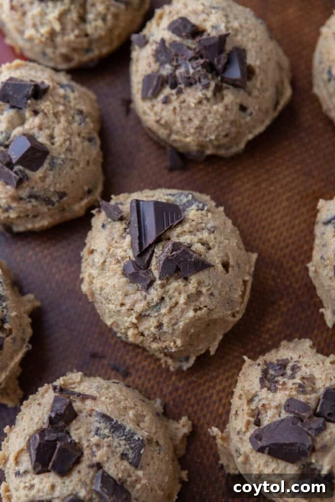 Decadent Soft Chewy Espresso Chocolate Chip Cookies 10 Scoops of cookie dough on a pan