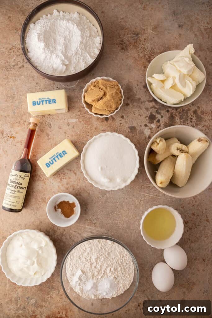 A collection of fresh ingredients for banana cake, including ripe bananas, butter, eggs, flour, and sugar, neatly arranged on a counter.