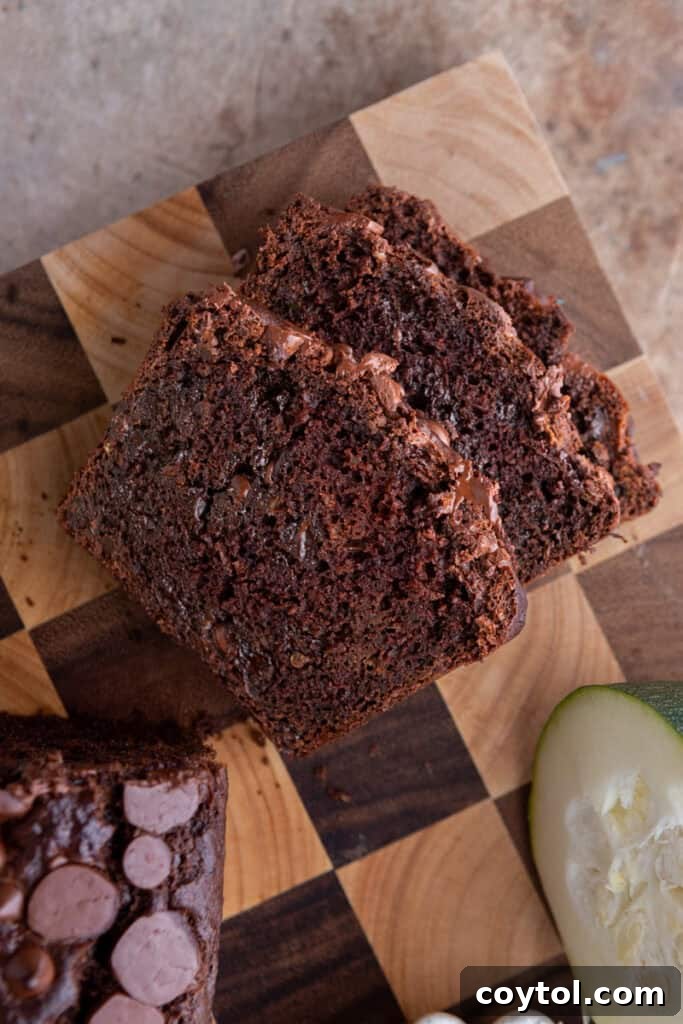 Overhead shot of the Double Chocolate Zucchini Bread recipe, garnished with chocolate chunks.