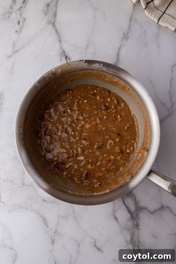 fully cooked mixed ingredients in a pot for pralines