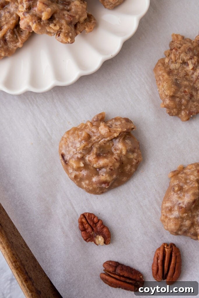 overhead shot of the finished praline patty cooling on parchment paper