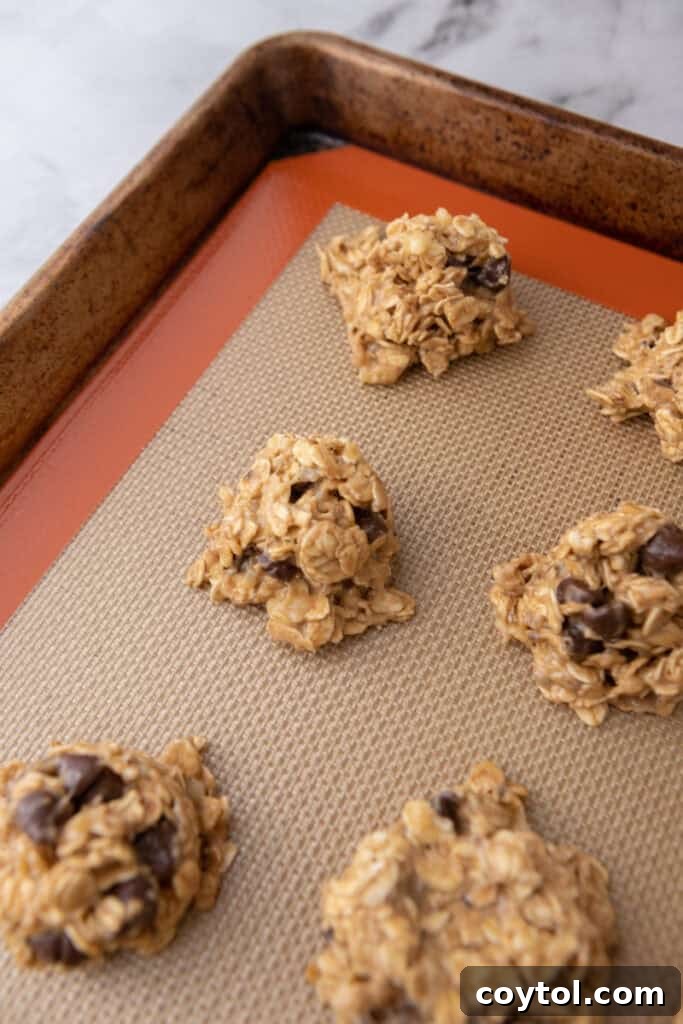 balls of dough on a baking sheet