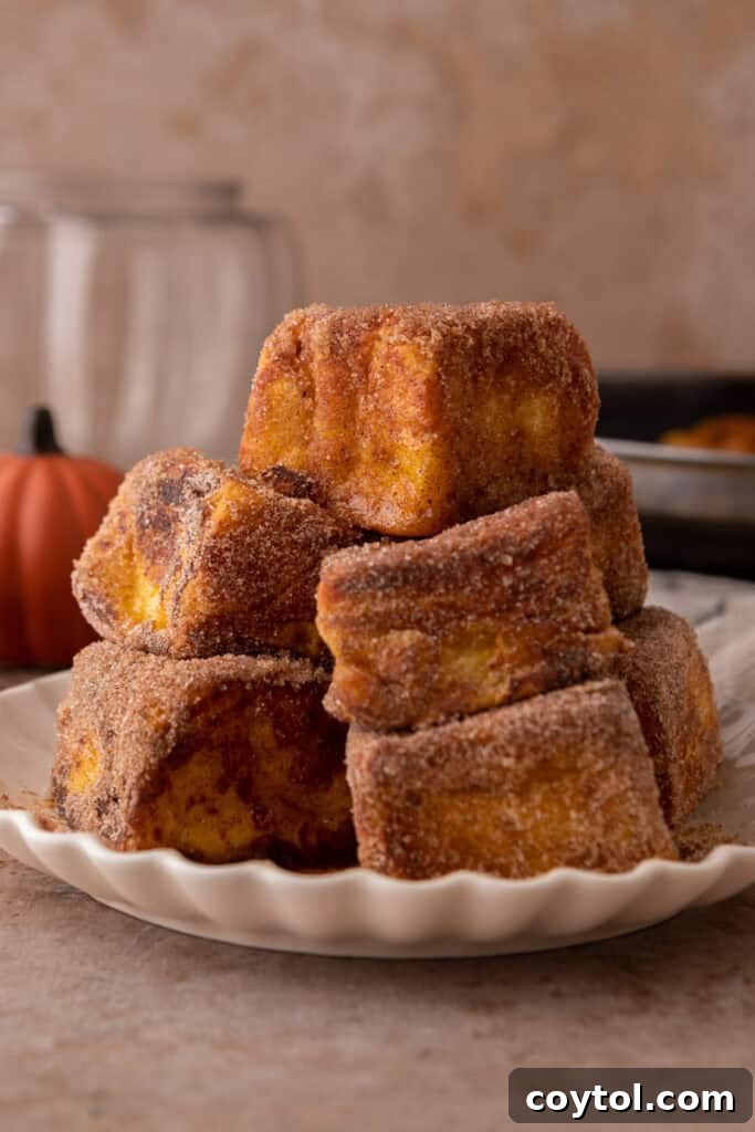 Hawaiian Roll Pumpkin French Toast squares on a plate