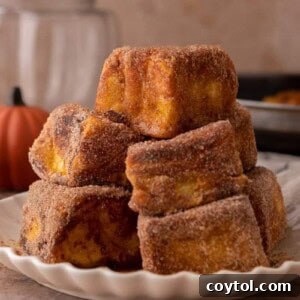 Hawaiian Roll Pumpkin French Toast squares on a plate