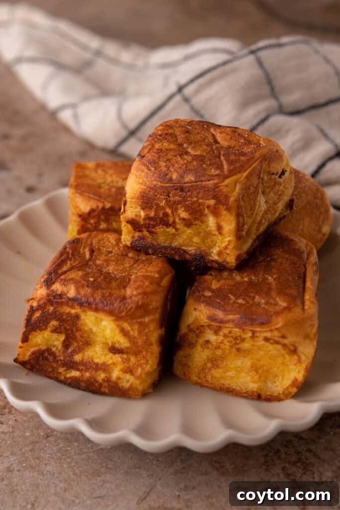 fully cooked bread squares on a plate