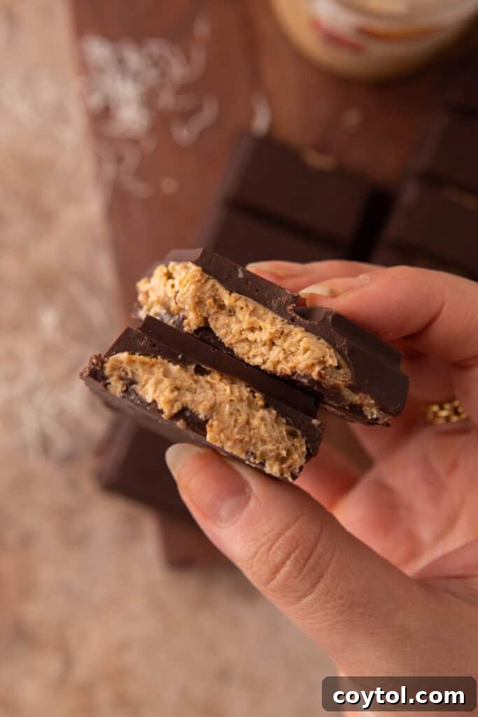Dubai's Ultimate Pistachio Chocolate Bar 15 Dubai pistachio chocolate bar recipe being held up by a hand