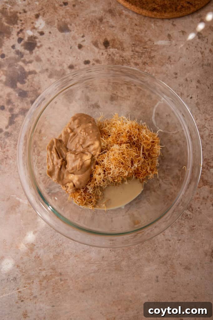 Dubai's Ultimate Pistachio Chocolate Bar 7 Pistachio cream, tahini, and kataifi in a bowl