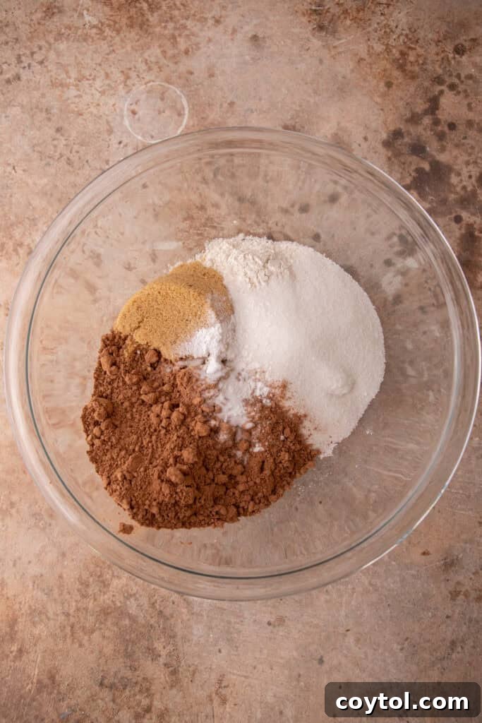 Dry ingredients for brownie mix unmixed in a bowl