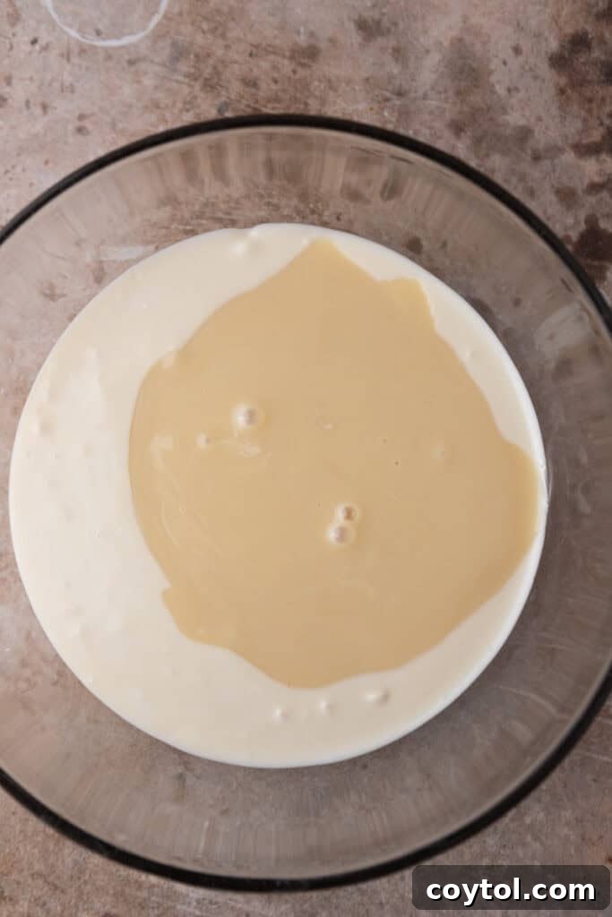 Instant Microwave Peanut Butter Fudge 5 A bowl containing unmixed ingredients for microwave peanut butter fudge, prior to heating.