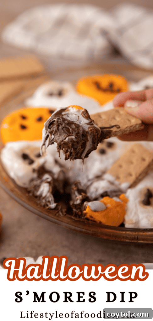 Wicked Good Halloween Smores Dip 13 Halloween S'mores dip recipe horizontal pin image