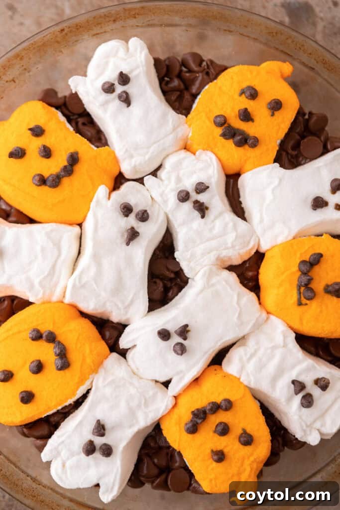 Wicked Good Halloween Smores Dip 4 Halloween S'mores Dip Recipe close up, showing gooey texture