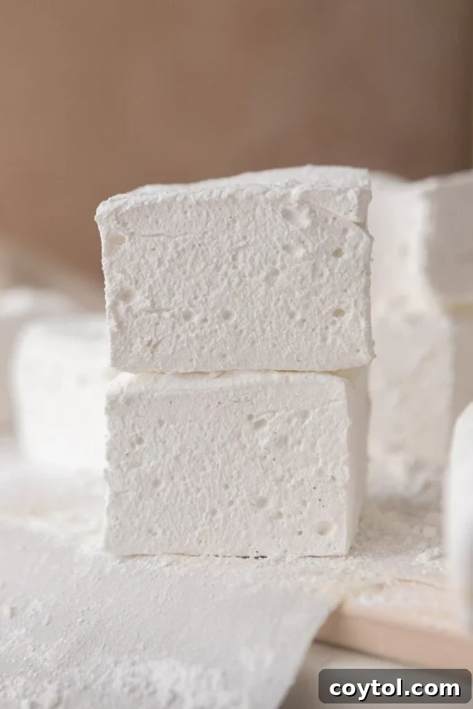 homemade marshmallows stacked high on a plate