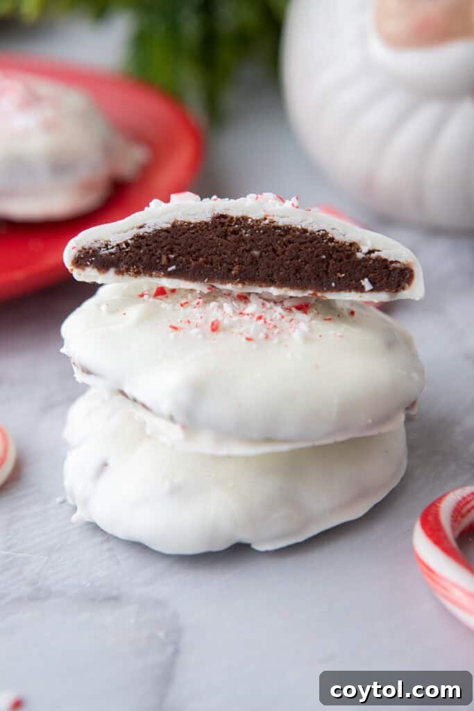 peppermint bark cookies stacked on top of each other