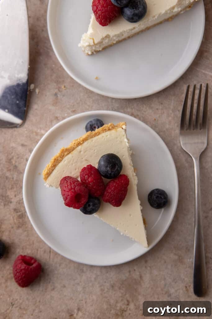 a High Protein Cottage Cheese Cheesecake slices on plate