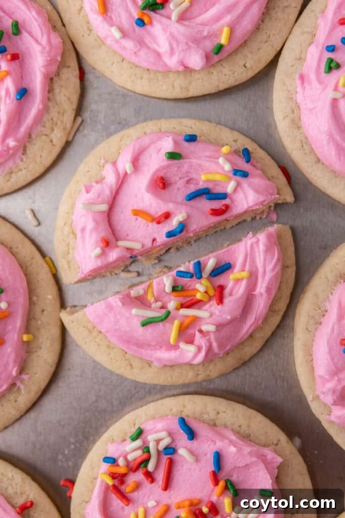 Pillowy Old-Fashioned Sour Cream Sugar Cookies 14 Soft frosted sour cream sugar cookies sliced in half to show texture