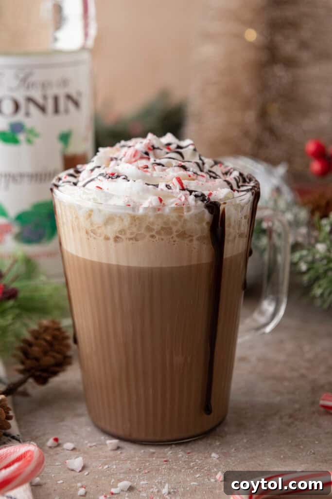 Mastering Starbucks Peppermint Mocha at Home 12 Side shot of a Starbucks Peppermint Mocha recipe with festive garnishes