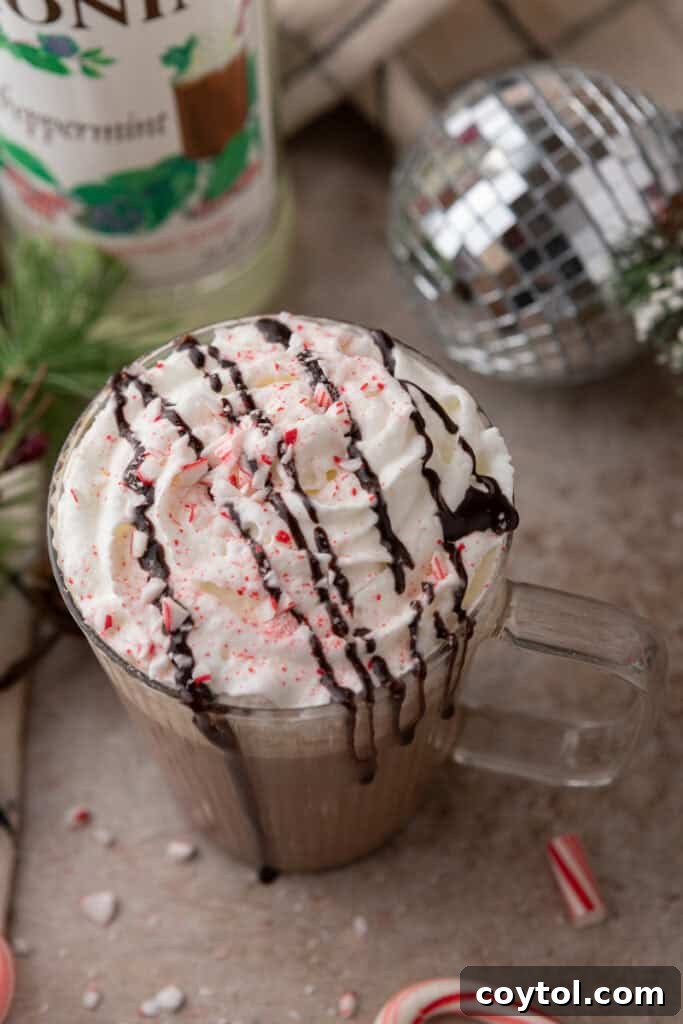 Mastering Starbucks Peppermint Mocha at Home 13 Overhead shot of a Starbucks Peppermint Mocha recipe with a decorative straw