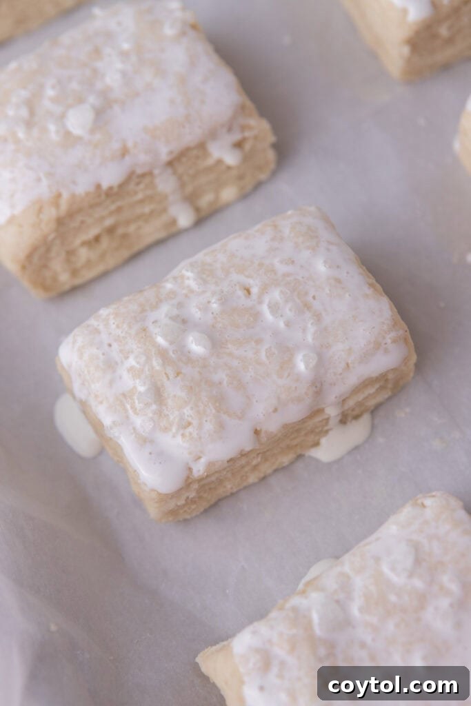 unbaked dough with cream brushed on top