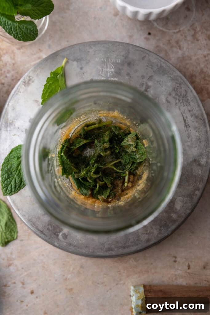 Mint and brown sugar in a cup
